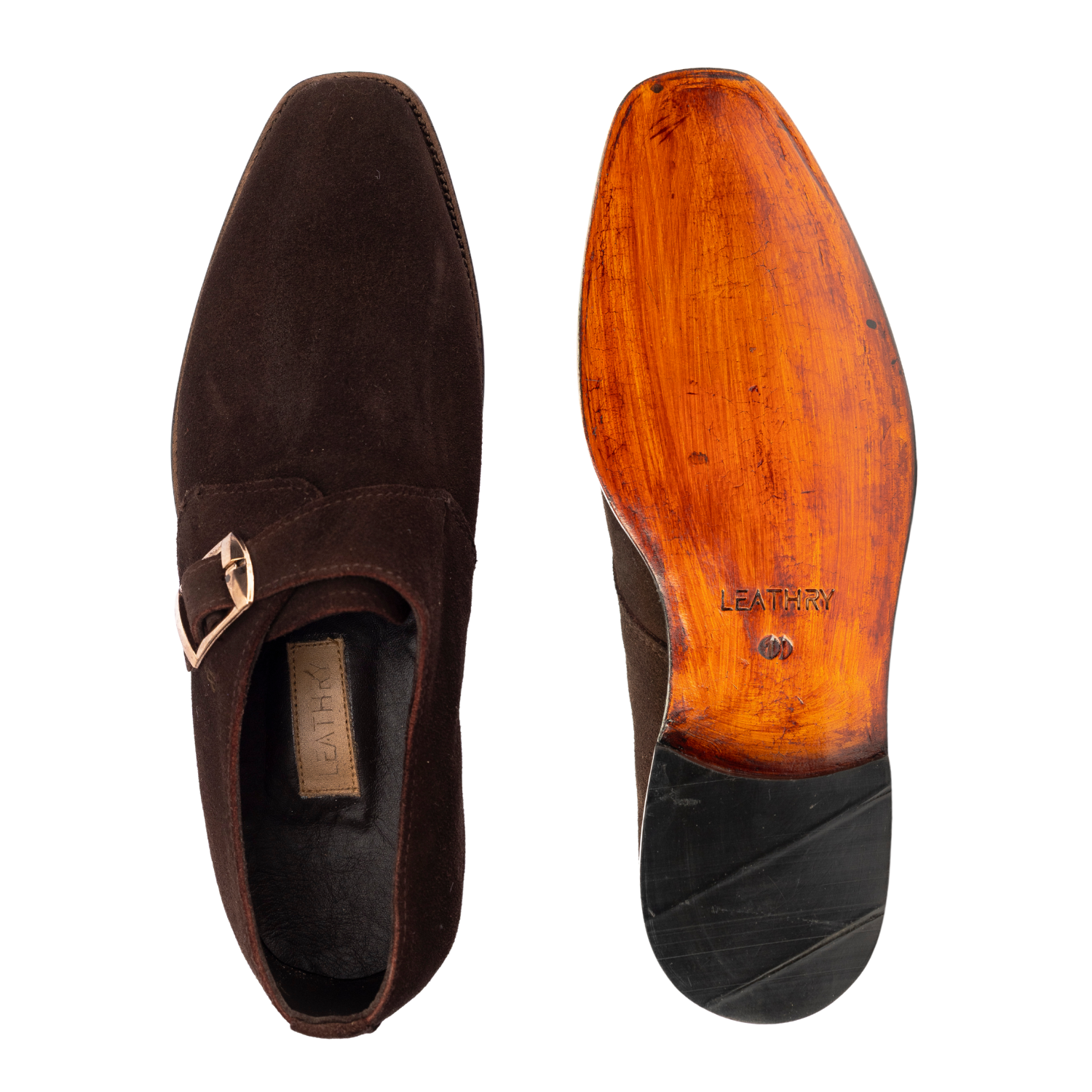 Brown suede shoe with a wooden sole on a white background