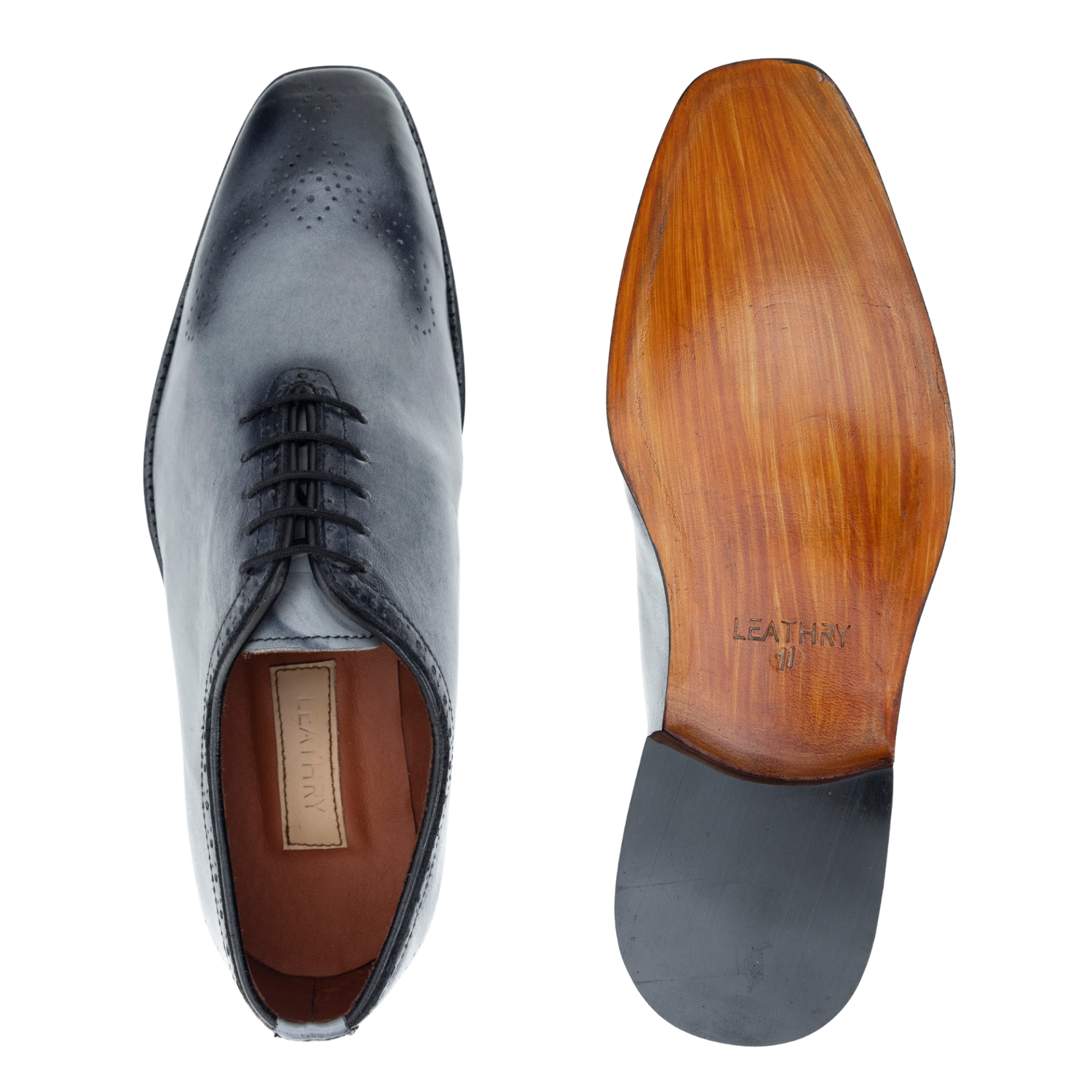 Gray leather dress shoe with wooden sole on a white background