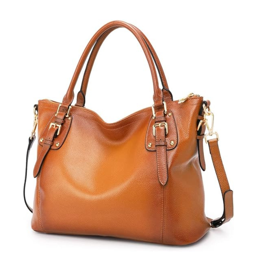Brown leather handbag with gold accents on a white background