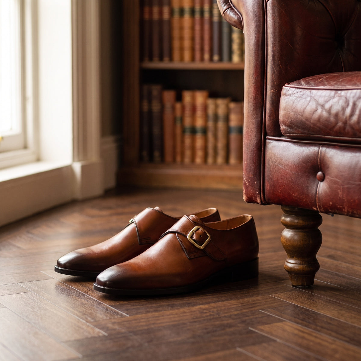 The Archer men's monk strap shoe in brown calf leather with patina finish, styled editorial photo