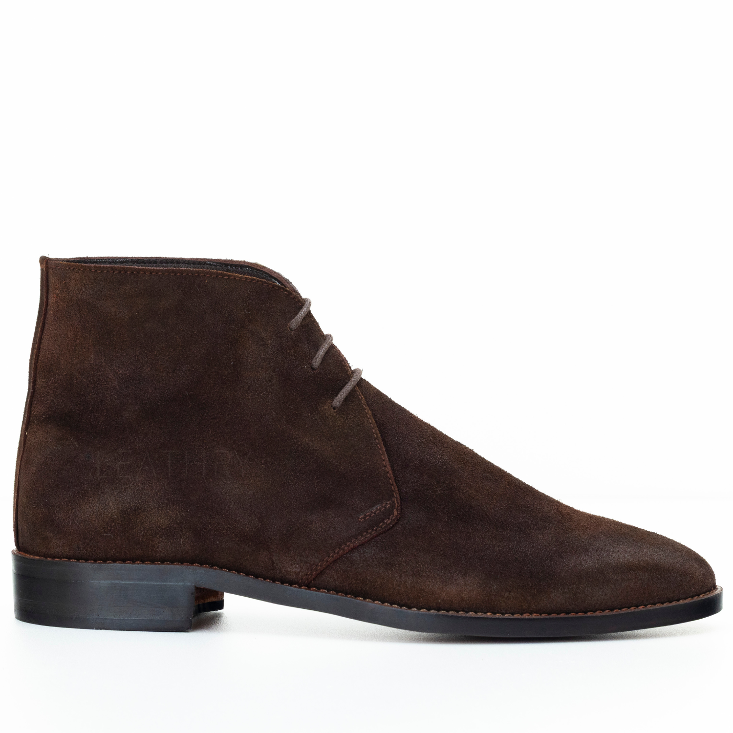 Brown suede ankle boot on a white background