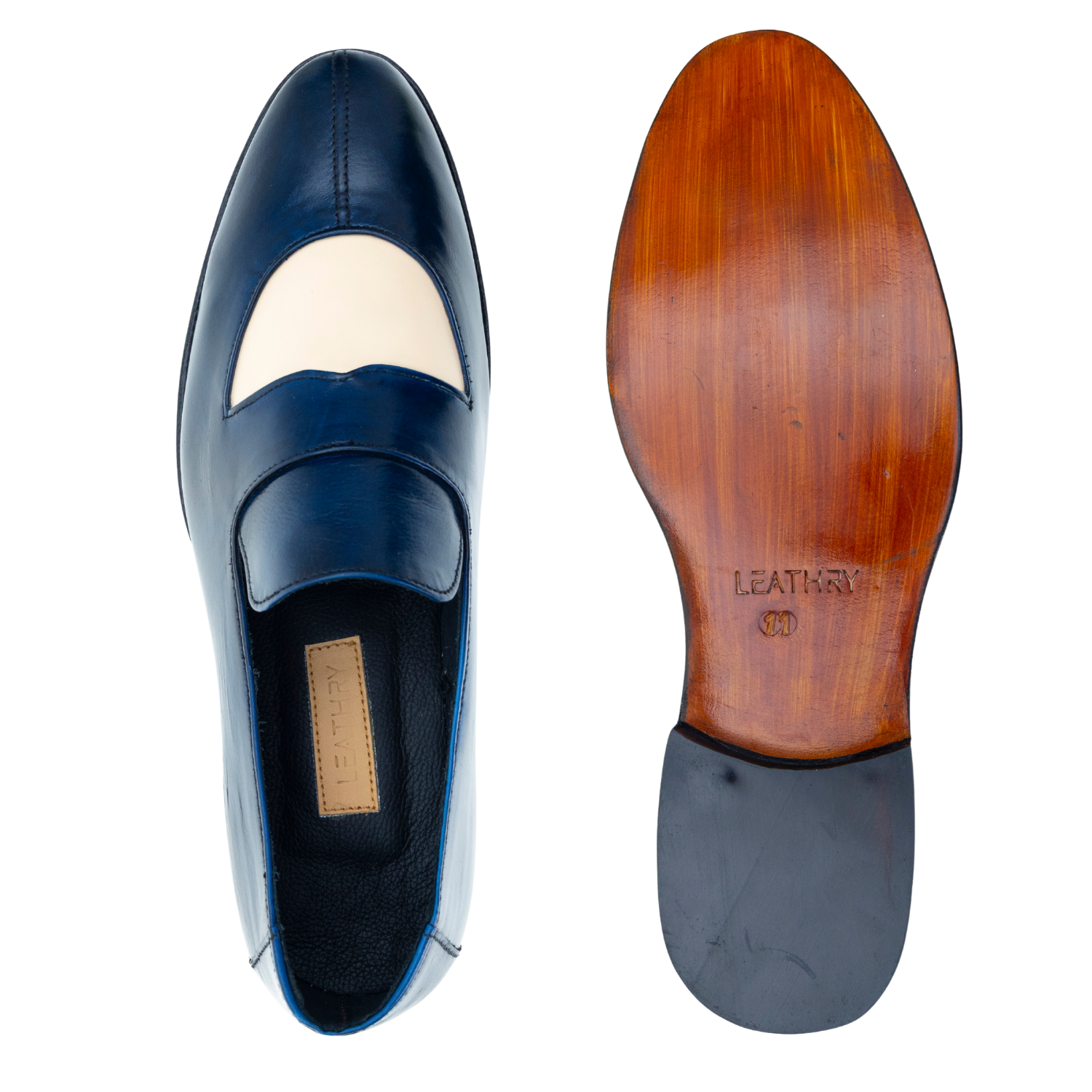Blue loafer shoe with white insole and wooden sole on a white background